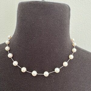 Tin cup pearl necklace